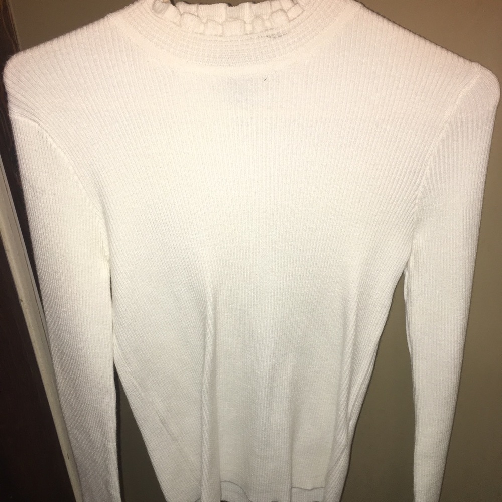 White frilly turtleneck long sleeve shirt